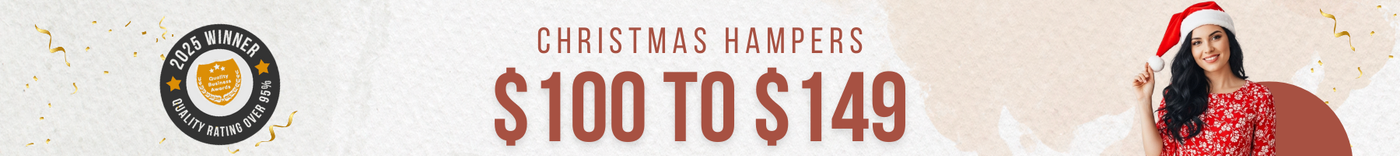 Christmas hampers priced $100 to $149 with 2025 Quality Business Awards winner badge and smiling woman in Santa hat