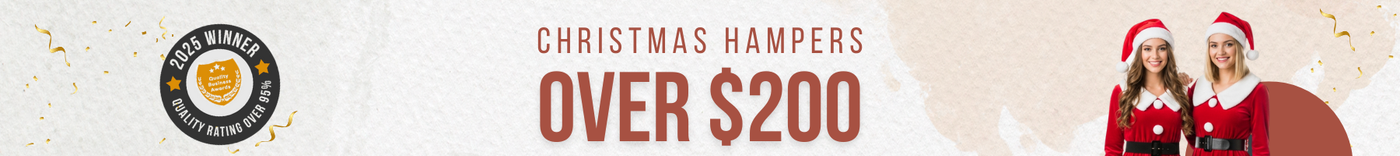 Two women in Santa costumes beside text 'Christmas Hampers Over $200' with 2025 quality award badge