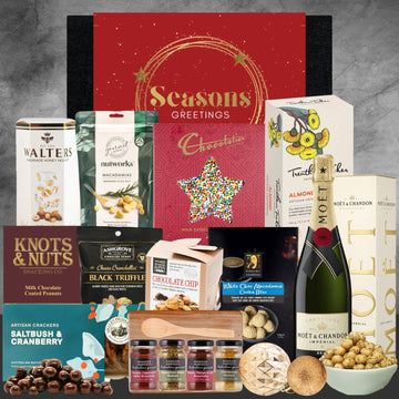 Luxury holiday gift hamper with chocolates, crackers, macadamias, truffle snacks, gourmet dips and MoΓ«t & Chandon champagne