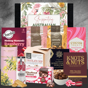 Collection of various food products and packaging on a gray background