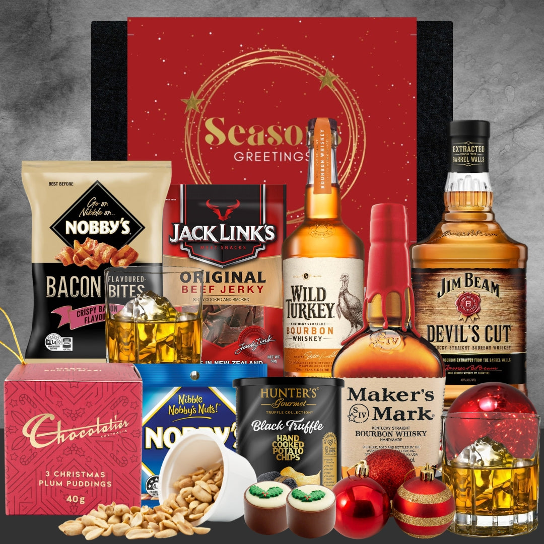 Holiday gift hamper with Jack Link's beef jerky, Nobby's snacks, Wild Turkey, Maker's Mark, Jim Beam bourbon, chocolates, and Christmas ornaments
