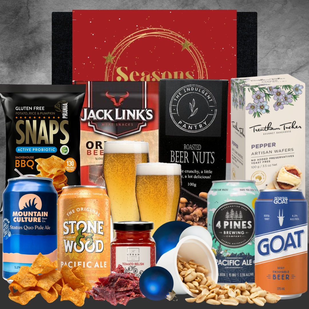 Assorted snacks, beer, and other products on a gray background