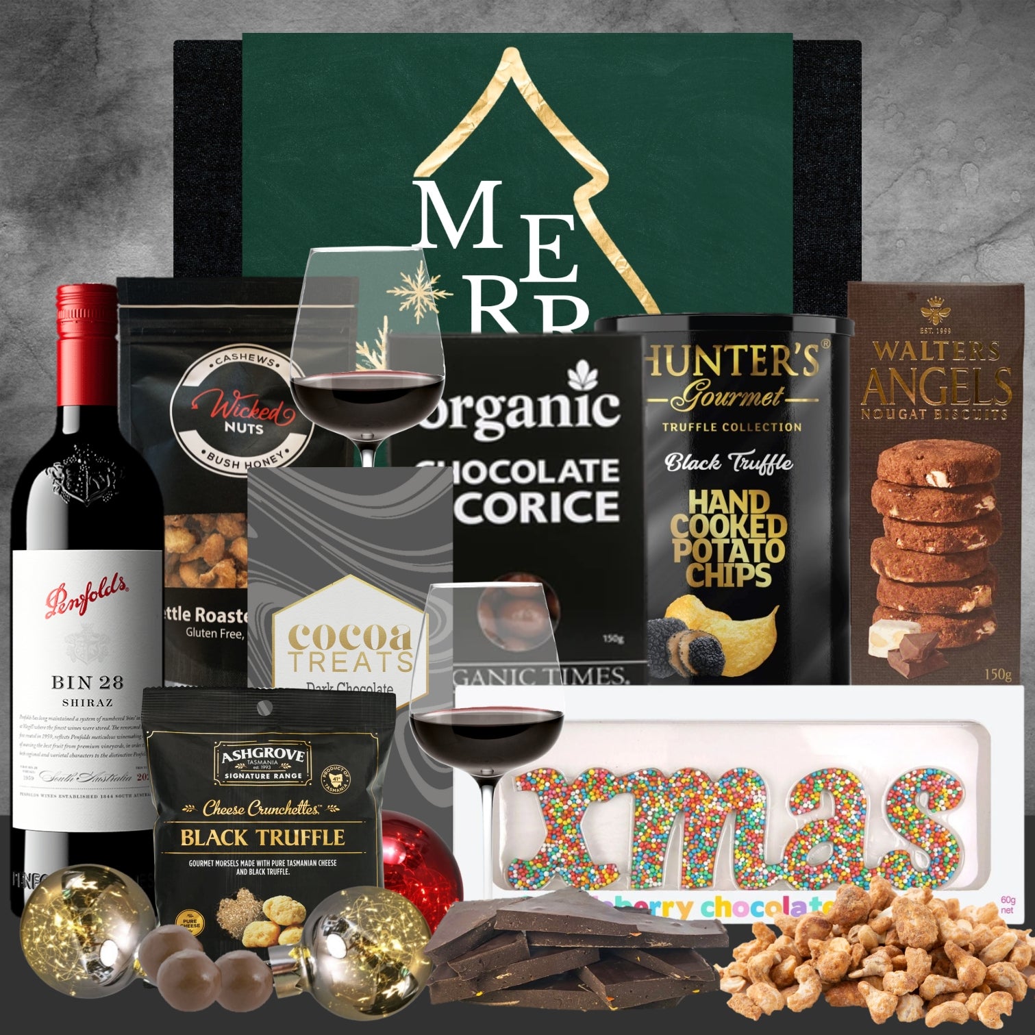 Holiday gift box with Penfolds Shiraz wine, hand cooked potato chips, organic chocolate licorice, nougat biscuits, and assorted chocolates