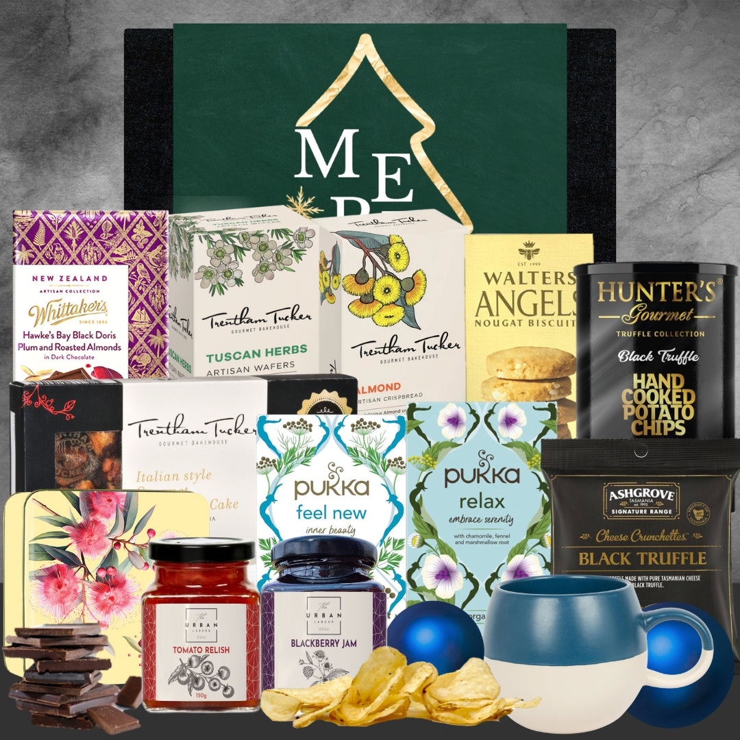New Zealand gourmet hamper with Whittaker's chocolate, Trentham Tucker wafers, Pukka teas, Hunter's chips, Ashgrove truffle snacks, and preserves