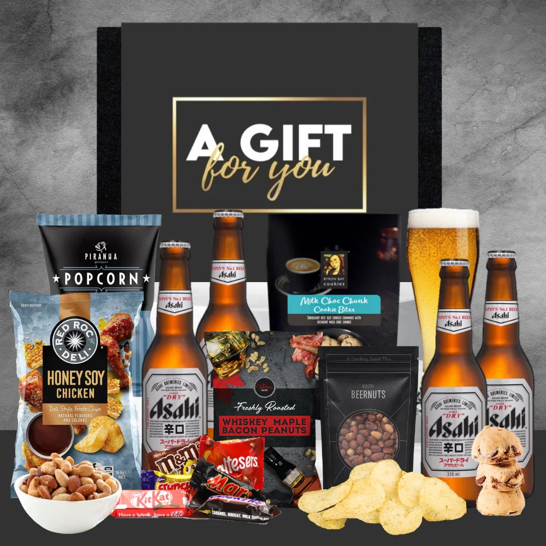 Gift box with beer bottles, snacks, and a 'Gift for You' card on a gray background