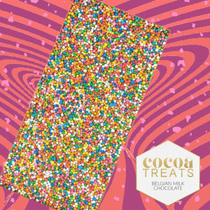 Cocoa Treats Belgian Milk Chocolate bar with colorful sprinkles on a wavy pink and purple background