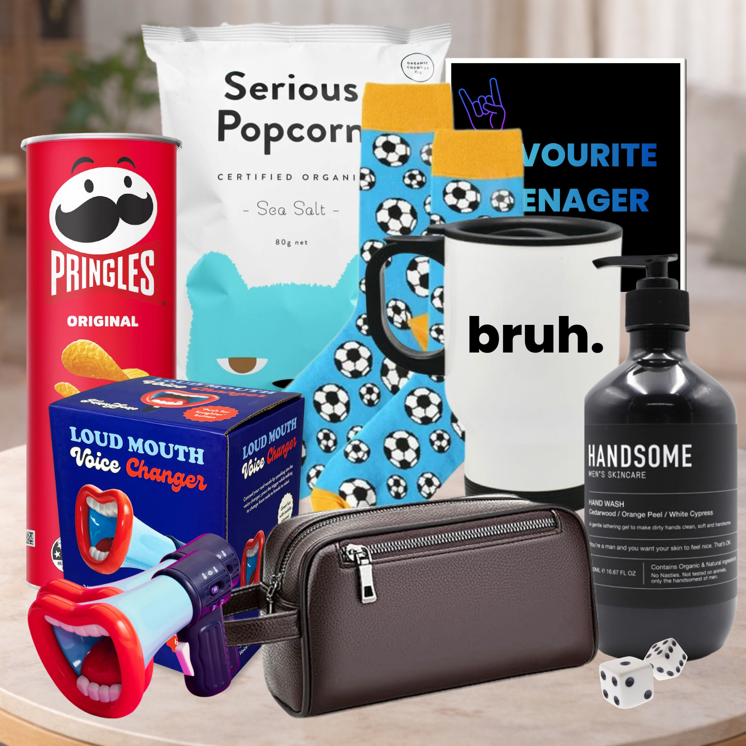 Collection of various items including Pringles can, popcorn bag, socks, mug, and bottle on a table.