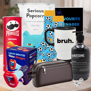 Collection of various items including Pringles can, popcorn bag, socks, mug, and bottle on a table.