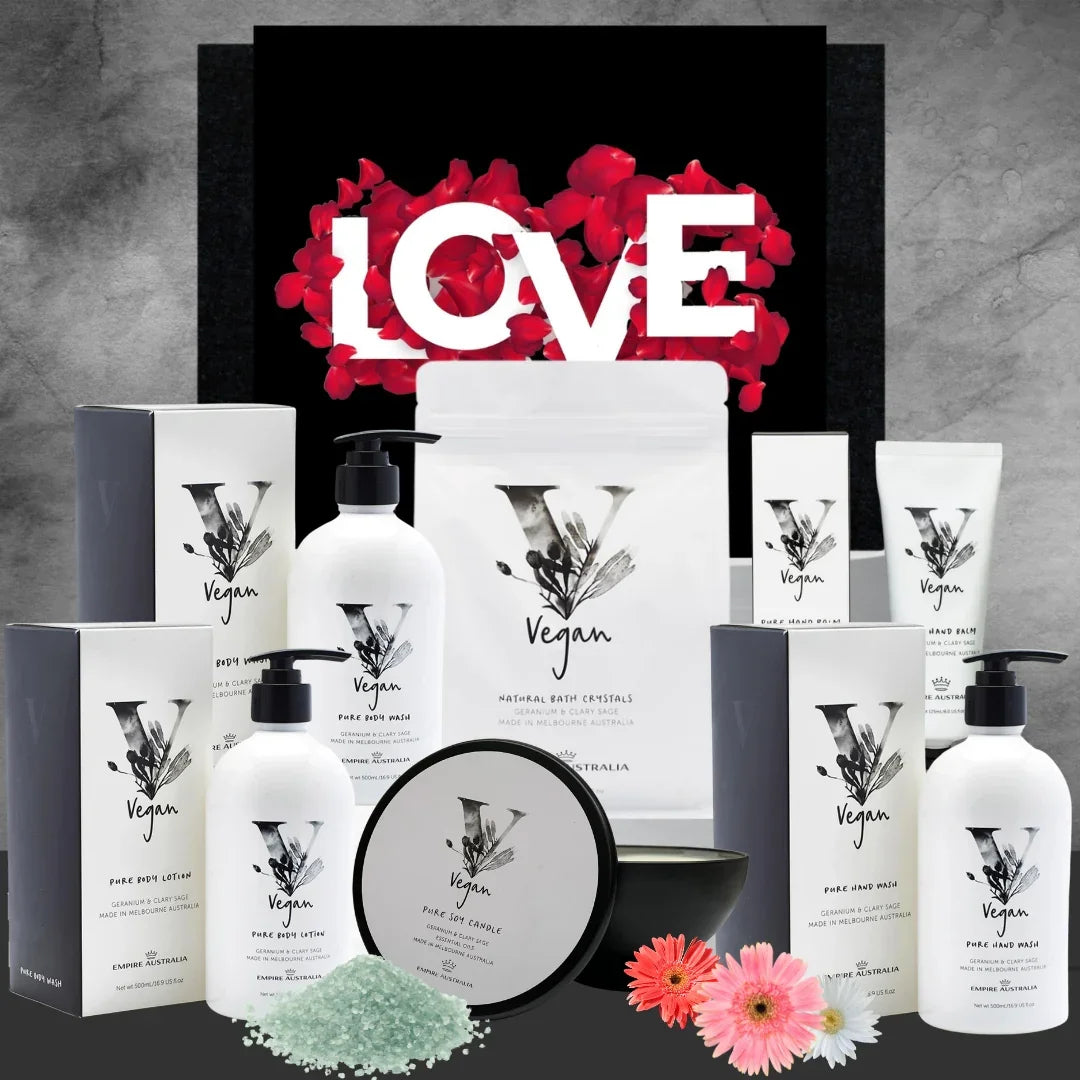 Collection of vegan skincare products with a 'LOVE' sign in the background.
