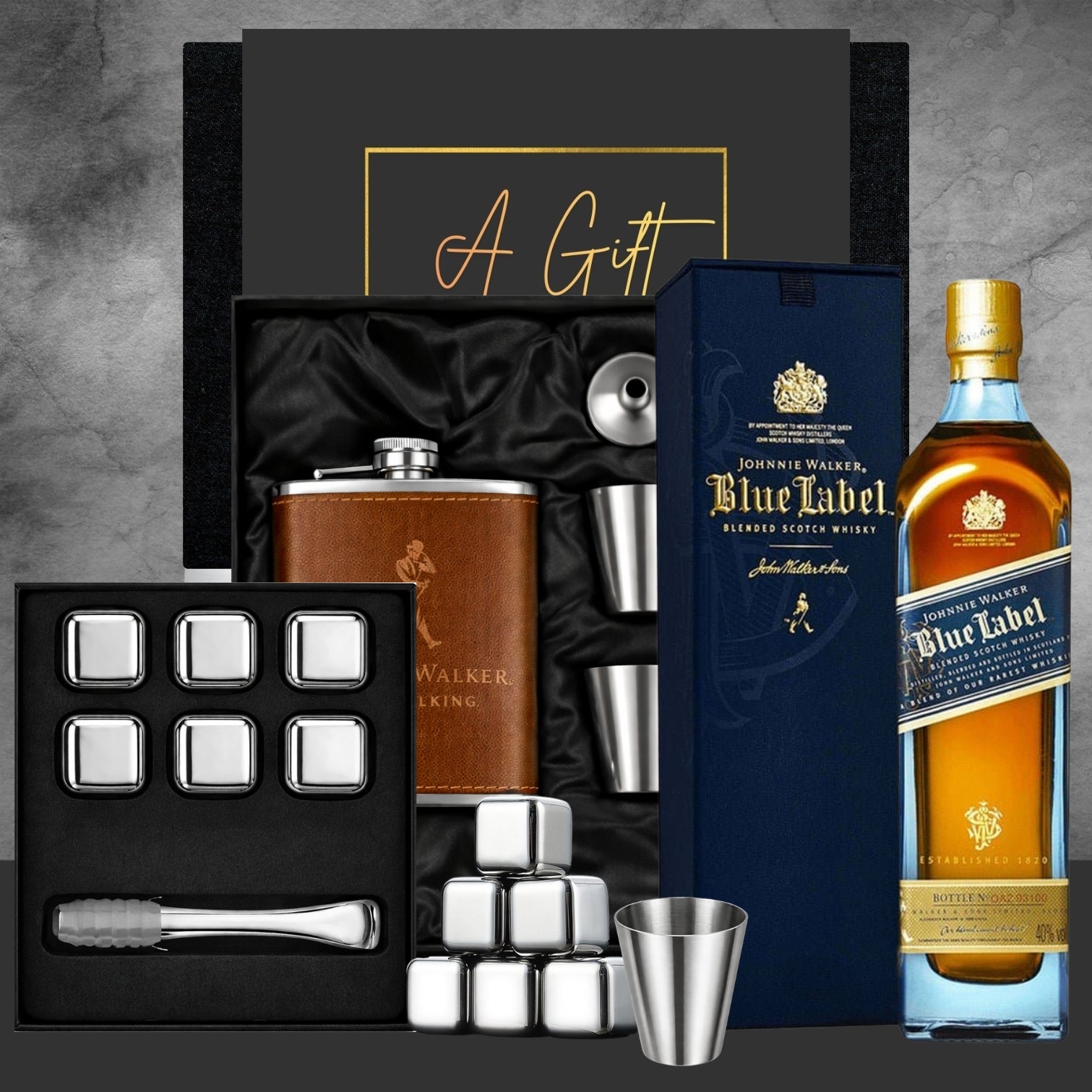 Johnnie Walker Blue Label whisky gift set with hip flask, ice cubes, and shaker.