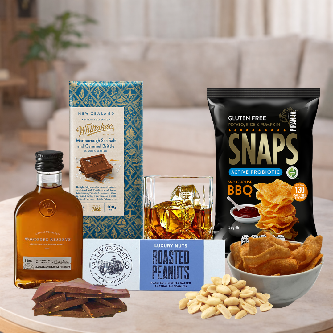 Snacks and drinks on a table with a blurred background of a living room.