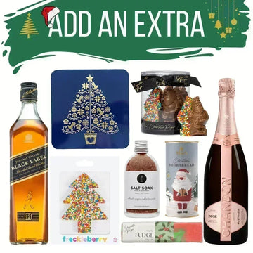 Collection of Christmas-themed products including a bottle of Johnnie Walker Black Label whisky, a Christmas tree coaster, a bottle of champagne, and other festive items.