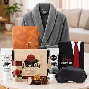 Father's Day Empire Pamper Hamper for Dad by Tastebuds featuring a luxury grey bathrobe, grooming set, leather notebook and Father's Day chocolate.