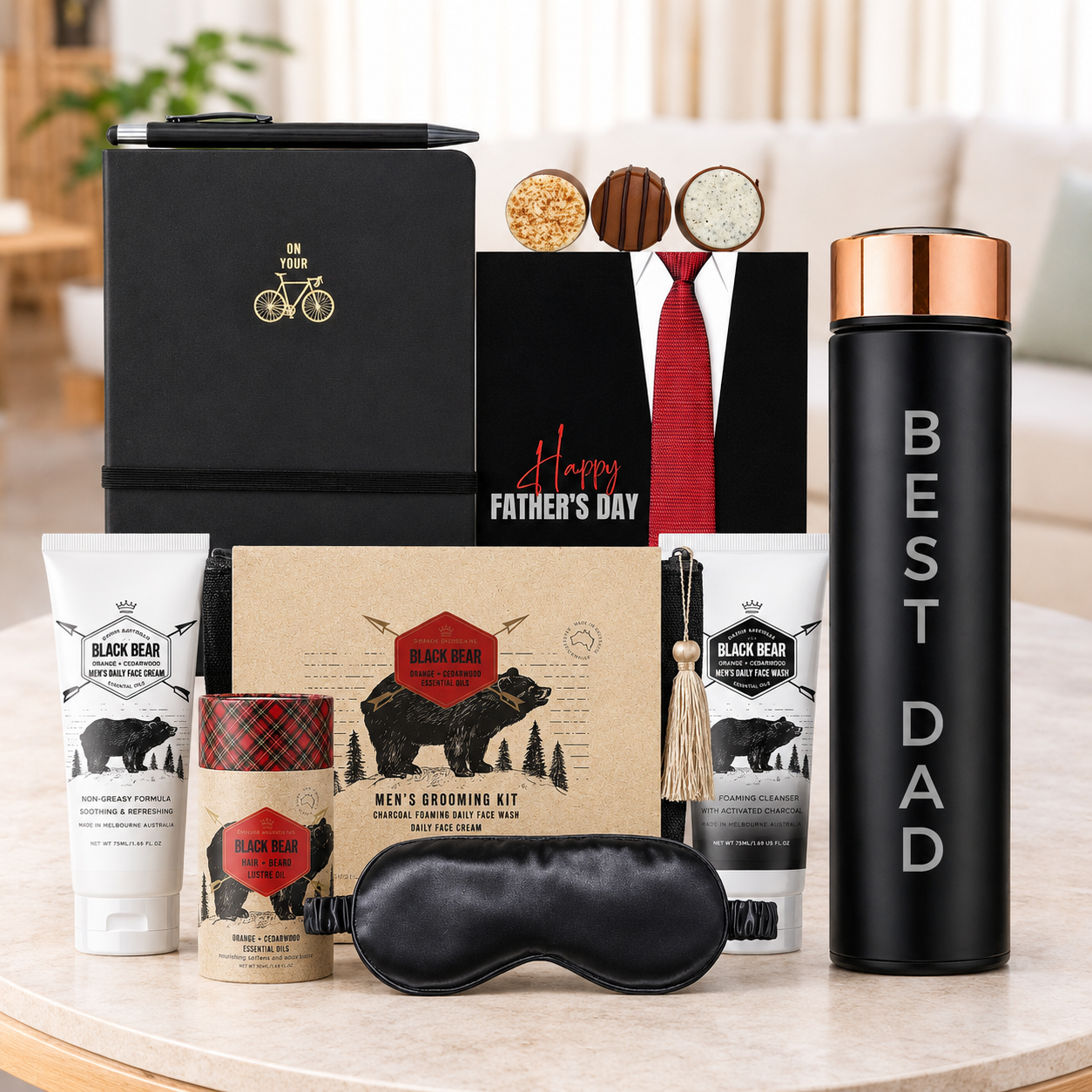 Father's Day Travel Gift Hamper for Dad by Tastebuds featuring a Best Dad travel bottle, grooming gift set, chocolates and personalised greeting card.