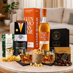 Tastebuds gourmet whisky hamper featuring premium Scotch whisky, slate coasters, whisky glasses, chocolate and gourmet snacks for Dad.