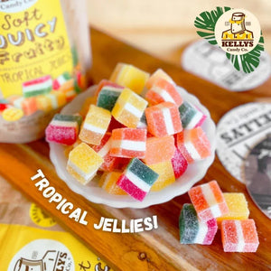Colorful jelly candies on a wooden surface with KELLY'S Candy Co. branding.