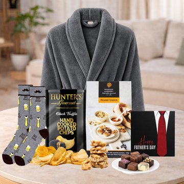 Pamper Gift Hamper for Dad with luxury bathrobe, black truffle potato chips, peanut crunch, Dad socks and Father's Day chocolate.