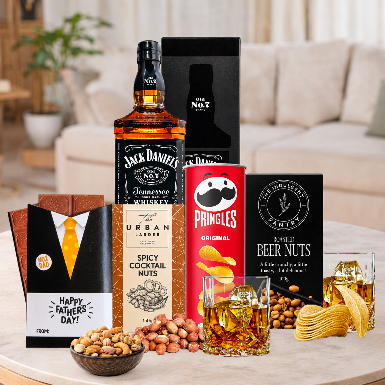 Scotch and whisky gift hamper for Dad with premium whisky, cocktail nuts, beer nuts, chocolates and savoury snacks.
