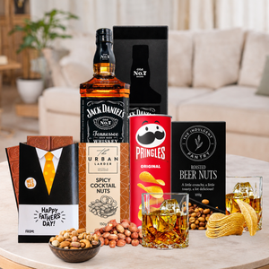 Scotch and whisky gift hamper for Dad with premium whisky, cocktail nuts, beer nuts, chocolates and savoury snacks.