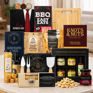 Ultimate BBQ & Gourmet Gift Hamper for Dad by Tastebuds featuring BBQ sauces, gourmet snacks, cheese board, chocolates and Father's Day treats.
